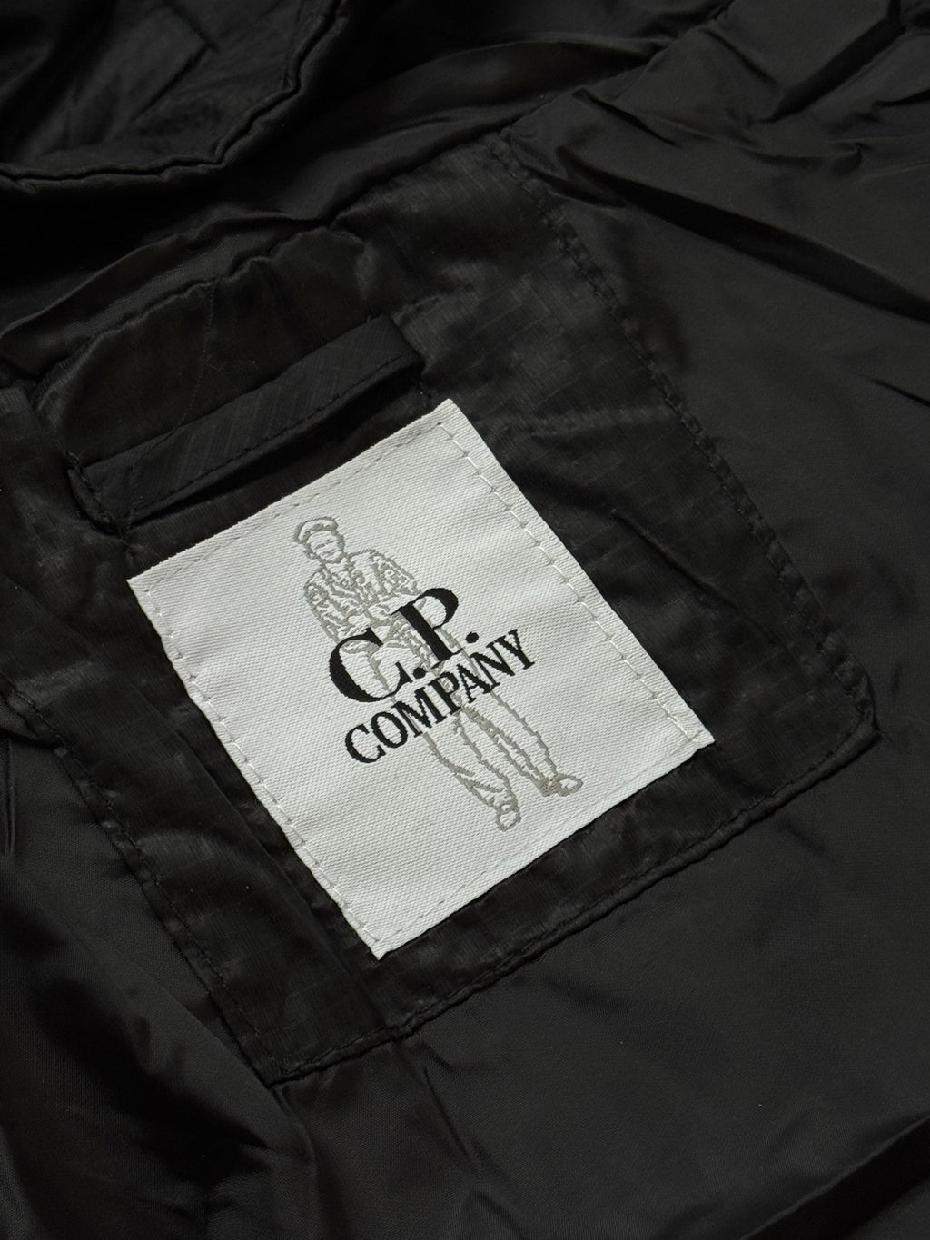 CP COMPANY x PALACE PUFFER BLACK JACKET