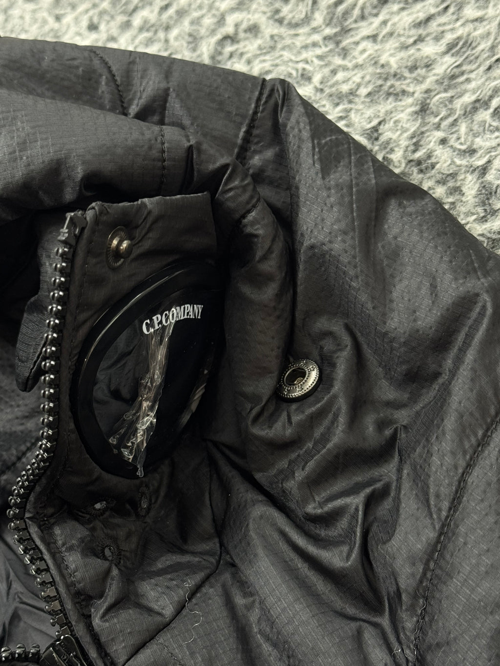 CP COMPANY x PALACE PUFFER BLACK JACKET