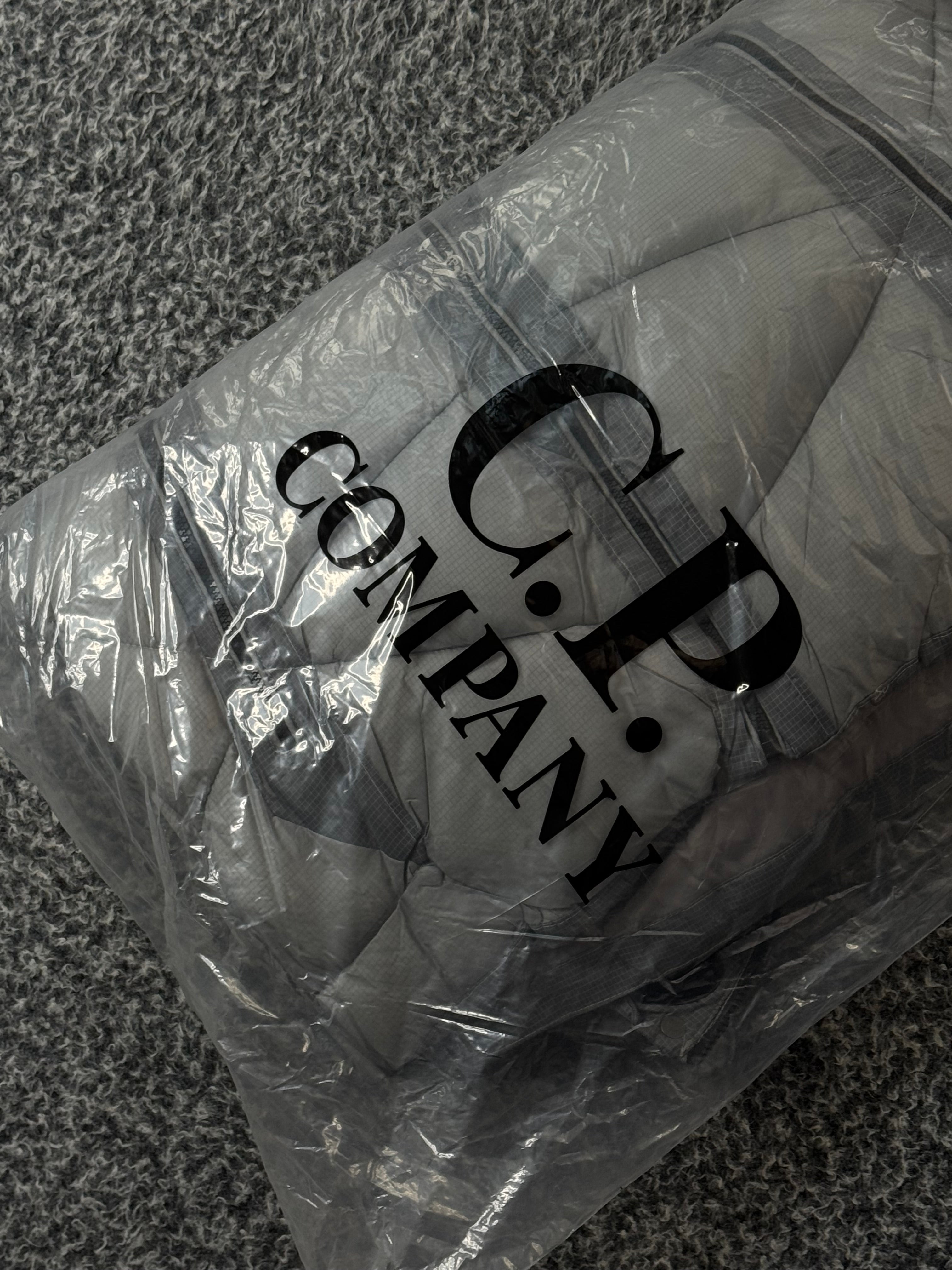 CP COMPANY x PALACE PUFFER JACKET GREY