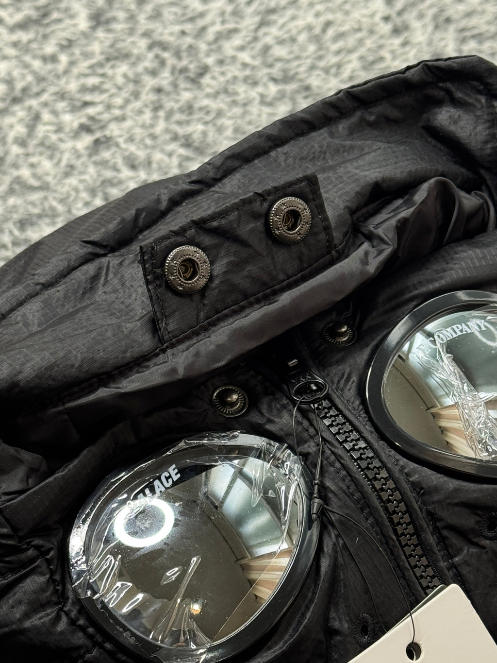 CP COMPANY x PALACE PUFFER BLACK JACKET